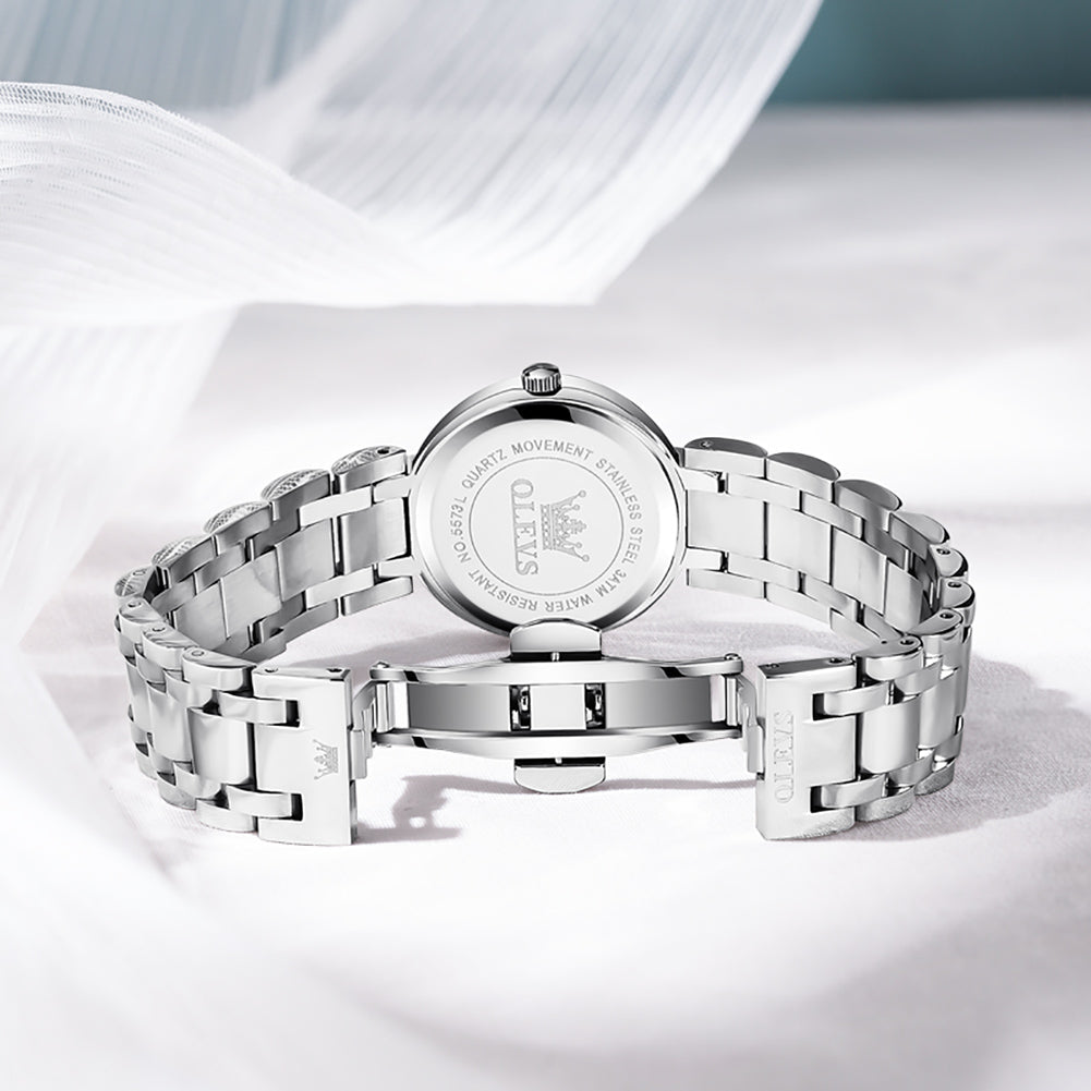 OLEVS 5573 Women's Quartz Watch with Arabic numerals and Diamond Dial Design, Blue Hands, Date Display, 3ATM Water Resistance